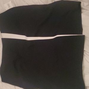 Calvin Klein new black skirt with white-edged flap. Size 14 never worn